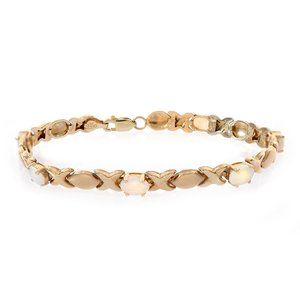 3.50 Ct.tw. Oval Cut White Opal Hugs And Kisses Bracelet 14K Gold